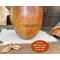 This shows the back of the pumpkin gourd that I engraved Archey's name into the shell using pyrography pens. 
